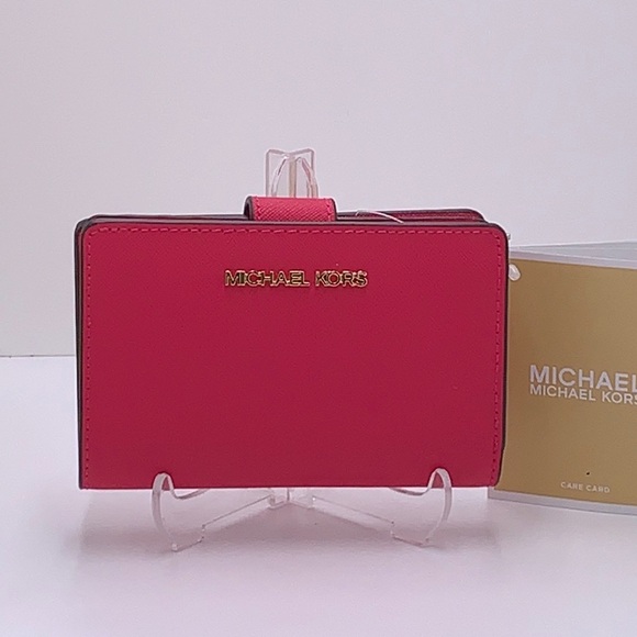 MICHAEL KORS
Md Jet Set Travel Crossgrain Leather Bifold Zip Wallet
El Pink
NWT - Picture 3 of 16